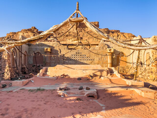 Abadoned bedouin altar in the middle of the desert under the blue sky. Nabatean altar. Historic...