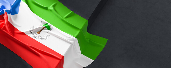Flag of Equatorial Guinea. Fabric textured Equatorial Guinea flag isolated on dark background. 3D illustration - 765526415