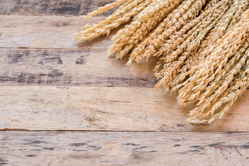 Wheat on the old wooden table background