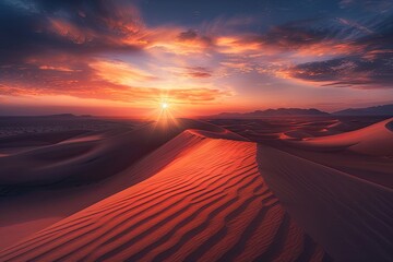 A mesmerizing sunset over the desert with sand dunes casting long shadows