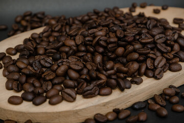 Roasted coffee beans black background 