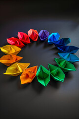 Colorful paper origami boats, DEI, diversity, equity and inclusion concept, . High quality photo