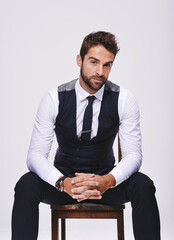 Man, fashion and portrait in studio with tuxedo or suit and isolated for trendy, style and classy....