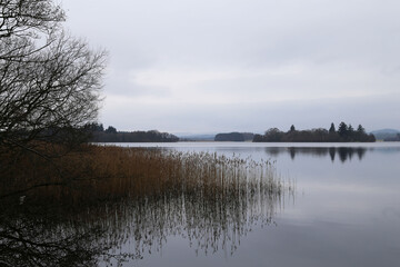 A view across Lake of Menteith in the Trossachs, Stirlingshire, Scotland on a still cold winter's morning.