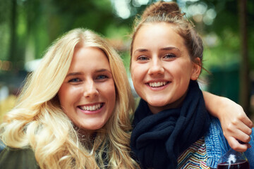 Fototapeta premium Park, friends and portrait of women hug outdoors on holiday, vacation and weekend in nature. Happy, smile and face of people embrace for bonding, fun and relax together on adventure, travel and trip