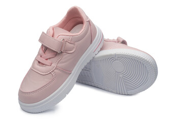 pink leather sneakers on isolated on a white background. children's sports shoes