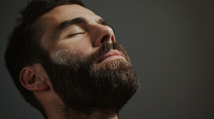 Obraz premium A profile view capturing a man's silhouette focusing to the side, evoking a sense of mystery on a dark background