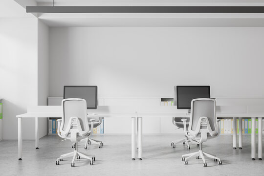 Minimalistic white open space office interior
