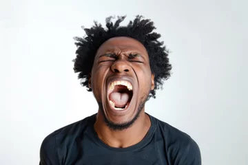 Fotobehang black man is yelling with a fully open mouth Isolated on white background © Igor