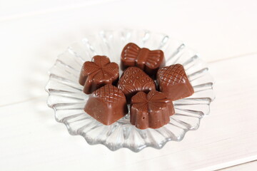 Chocolate Pralines on glass plate