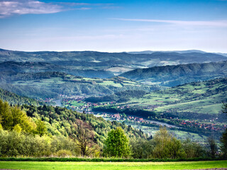 View of Tylmanowa village and Island Beskids, Beskid Sadecki from Gorce Mountains. Poland.