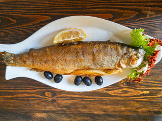 Smoked mountain trout on the table
