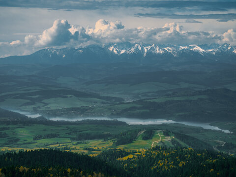 View of High Tatras and Lake Czorsztyn from Gorce Mountains