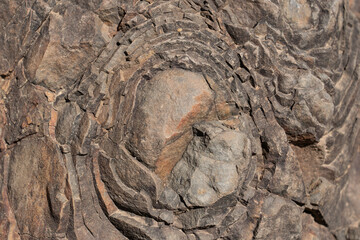 Spheroidal weathering tholeiitic basalt.   onion skin weathering, concentric weathering, spherical weathering, or woolsack weathering. Ka'iwa Ridge (Lanikai Pillbox) Trail Oahu Hawaii Geology
