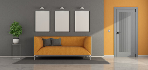 Modern living room interior with sofa and blank wall art