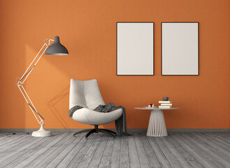 Reading corner with modern armchair and orange walls