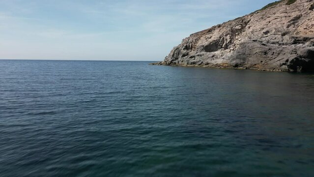 Wonderful view from above of the coast of Sardinia. "Cala della Signora" on a sunny summer day