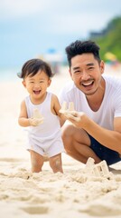 A man and a child are playing in the sand on a beach
