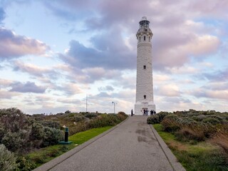 Cape Leeuwin lighthouse in Western Australia with tourist during sunset with dramatic sky