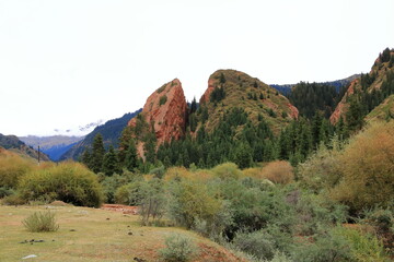 Broken heart cliff. Unusual rock formations from red sandstone in canyon Seven bulls in Jeti-Oguz,...