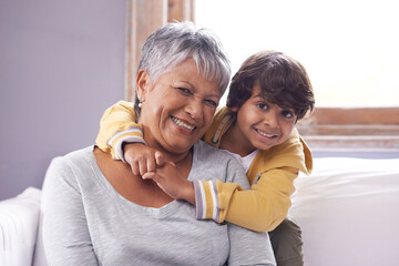 Smile, sofa and portrait of grandmother with kid for love, support and childhood development at home Relax, elderly woman and boy with happiness for weekend, care and bonding together in living room