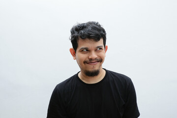 a smiling asian man with a funny face