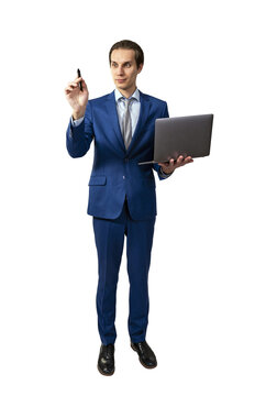 A young businessman in a blue suit holding a laptop and marker, gesturing as if to write or draw, on a white background, depicting a teaching or presenting concept