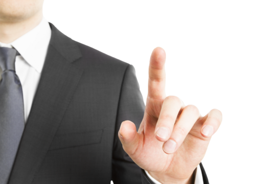 A businessman in a suit touching an invisible virtual screen against a white background, depicting a concept of modern technology - Powered by Adobe