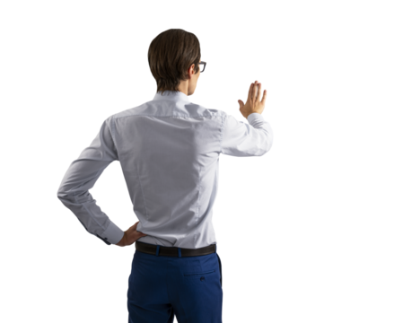 A young man in business attire interacting with a virtual screen, isolated on a white background, concept of technology use