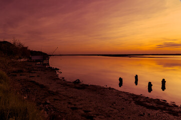 sunset at Pialassa Baiona near Marina Romean (Italy)
