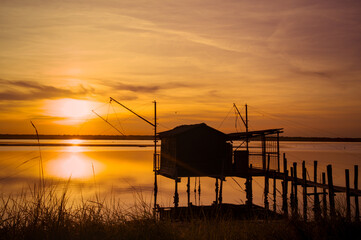 sunset at Pialassa Baiona near Marina Romean (Italy)