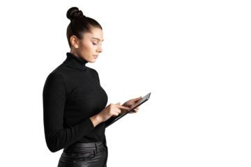 A young woman in business attire using a tablet, isolated on a white background, symbolizing modern work and technology