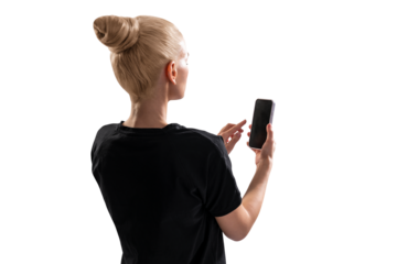 A woman from behind using a smartphone isolated on a white background, concept of technology use and social networking