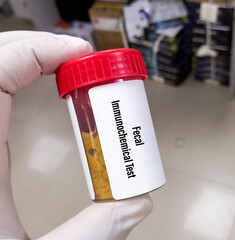 Fecal sample for faecal immunochemical (FIT) test, a fecal occult blood test for screening bowel cancer. - obrazy, fototapety, plakaty