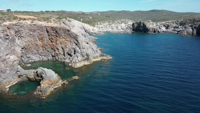 Wonderful view from above of the coast of Sardinia. "Cala della Signora" on a sunny summer day