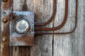Ampere guage, Vintage Ampere guage on wooden wall background, Older Ampere meter reading, retro...