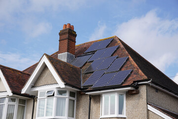 Solar panels on roof of house. Sustainable and clean energy source for home. photovoltaic cells. energy industry 