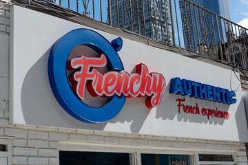 Fototapeta premium exterior building and sign of O'Frenchy, a dessert restaurant, located at 163 John Street in Toronto, Canada