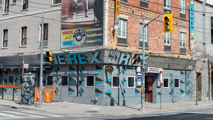 Fototapeta premium exterior building facade and sign of The Rex Hotel Jazz and Blues Bar located at 194 Queen Street West in Toronto, Canada