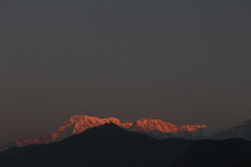 Sunset/Morning glow over mountains. Dusk, dawn in Nepal.