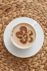 A cup of delicious morning coffee with cinnamon flower. Directly above - 765695255