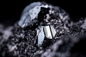 big hematite crystal on manganese macro photography. From Wessels Mine, Kalahari Manganese Fields,...