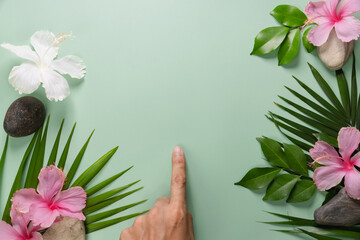 Man's hands on a green background ecological concept