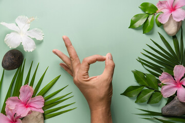 Man's hands on a green background ecological concept