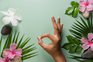 Man's hands on a green background ecological concept