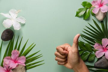 Man's hands on a green background ecological concept