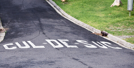 Cul de sac, road and outdoor with sign for warning with mistake, joke or comic text in...