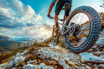 Mountain Biking Adventure on Rocky Trail with Scenic Skyline Cyclist in Action Capturing Outdoor Excitement and Extreme Sport Challenge