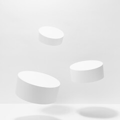 Abstract white scene mockup - three round tilt white cylinder podiums levitate in hard light, shadow. Template for presentation cosmetic products, goods, advertising, design, sale in fashion style.