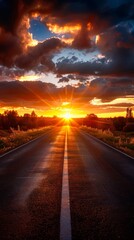 A road with a sun shining on it